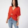 Karen Kane Clothing Rattan Buckle Twist Top